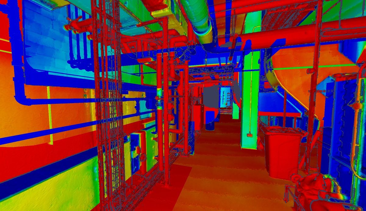 Deviation heat map of the same plant room view, colour-coded by distance from the design model