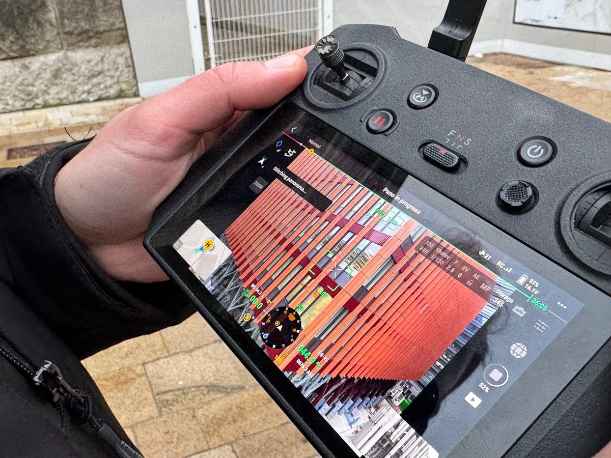 Drone controller screen showing a façade panorama being captured