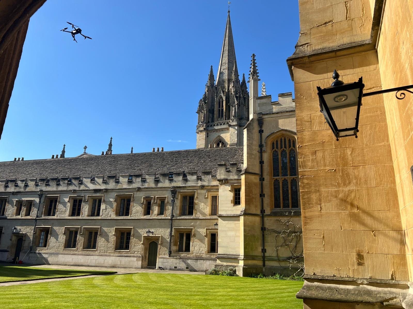 Survey drone in flight over a historic college quad in Oxford